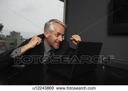 Happy businessman View Large Photo Image Stock Photo - Happy businessman. Fotosearch