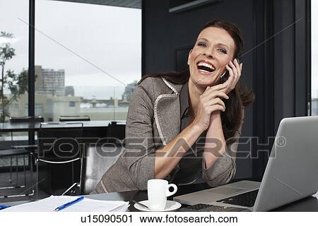 Stock Image - Happy businesswoman. Fotosearch