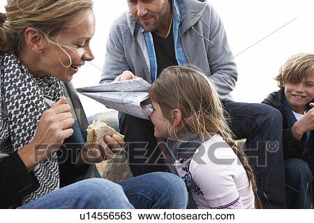 Happy family outdoors View Large Photo Image Stock Image - Happy family outdoors. Fotosearch
