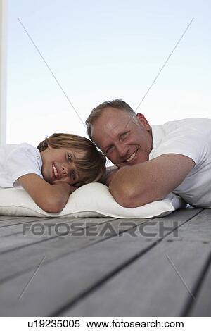Happy father and son View Large Photo Image Stock Photography - Happy father and son. Fotosearch