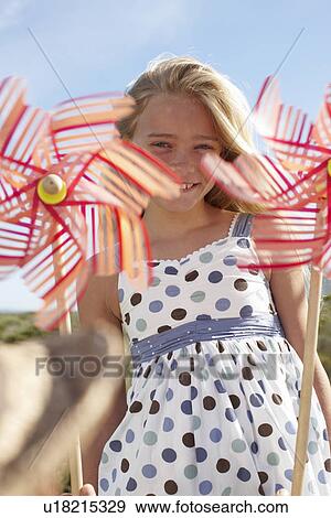 Stock Photo - Happy little girl. Fotosearch