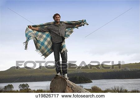 Stock Photo - Happy man in the countryside. Fotosearch