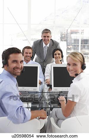 Stock Photo - Happy people at work. Fotosearch - Search Stock Images, Mural Photographs, Pictures, and Clipart Photos