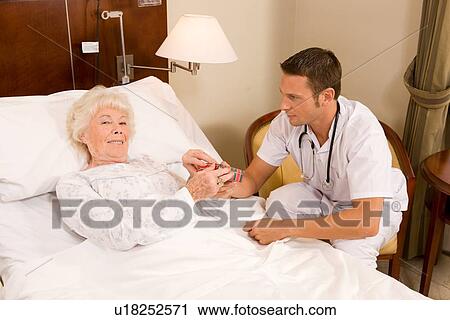 Stock Image - Happy senior patient. Fotosearch