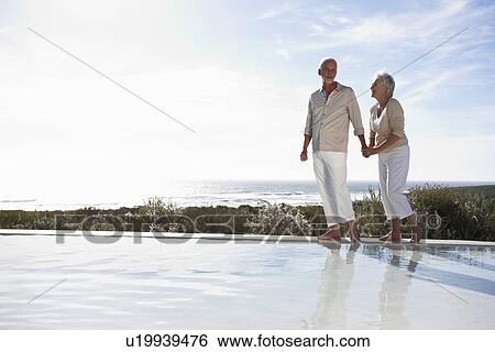 Stock Photograph - Happy seniors couple. Fotosearch