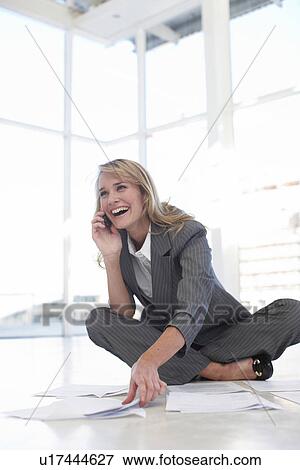 Happy woman at work View Large Photo Image Stock Photo - Happy woman at work. Fotosearch