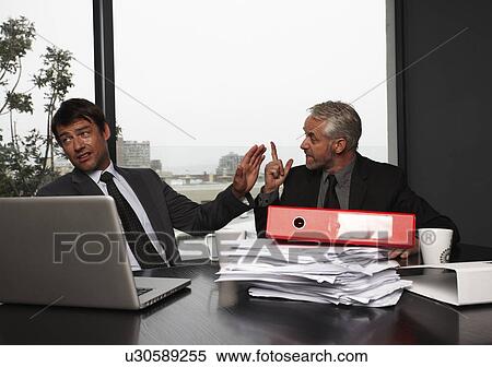 Stock Photography - Hard negotiation. Fotosearch