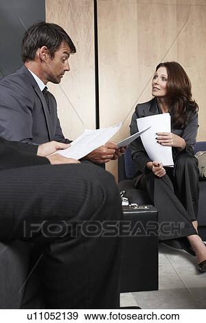 In a business meeting View Large Photo Image Stock Photo - In a business meeting. Fotosearch