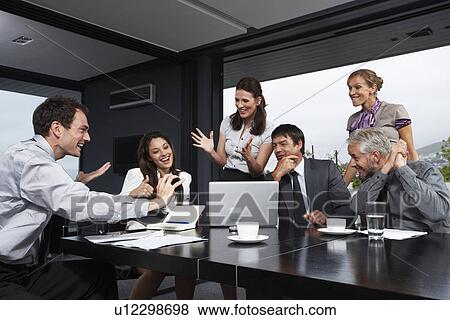 Stock Photo - Just won a contract. Fotosearch
