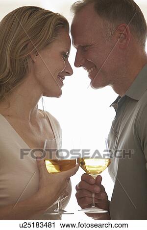 Loving couple drinking wine View Large Photo Image Stock Image - Loving couple drinking wine. Fotosearch