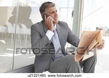 Stock Photography - Making a business call. Fotosearch