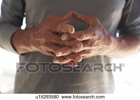 Stock Image - Male's hands. Fotosearch