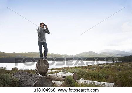 Stock Photo - Man in the countryside. Fotosearch
