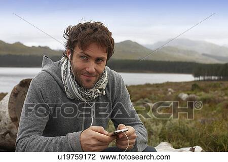 Man listening to music View Large Photo Image Stock Image - Man listening to music. Fotosearch