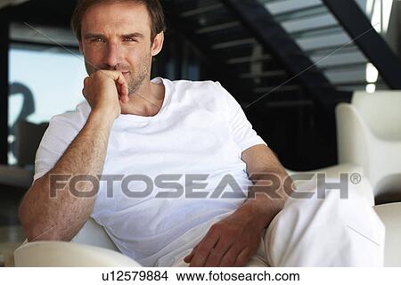Picture - Man looking to the camera. Fotosearch