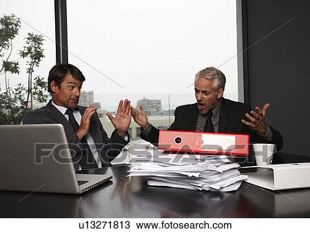 Man shouting at his colleague View Large Photo Image Stock Image - Man shouting at his colleague. Fotosearch