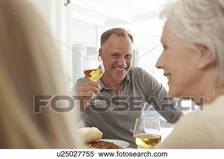 Stock Photography - Man with a glass of wine. Fotosearch