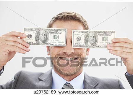 Stock Photo - Man with dollars. Fotosearch