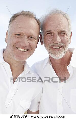 Man with his father View Large Photo Image Picture - Man with his father. Fotosearch