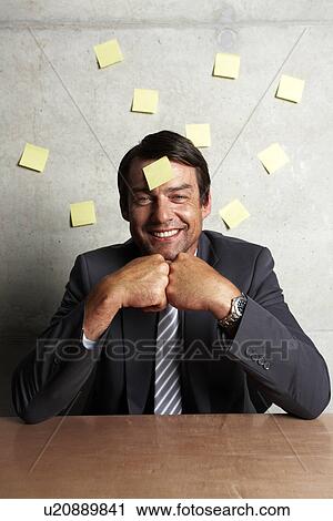 Man with sticky notes on his head View Large Photo Image Stock Image - Man with sticky notes on his head. Fotosearch