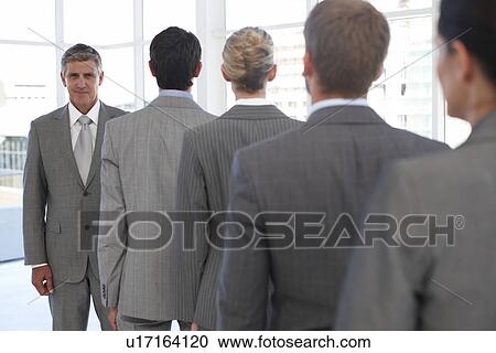 Manager with his staff View Large Photo Image Stock Image - Manager with his staff. Fotosearch