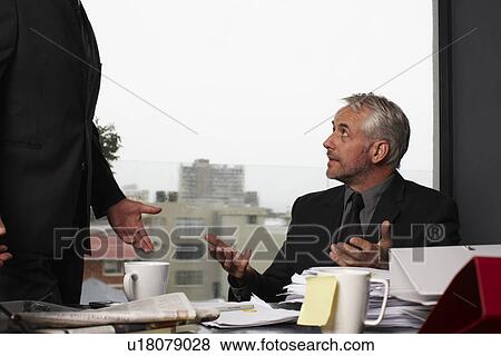 Mature businessman at work View Large Photo Image Stock Photo - Mature businessman at work. Fotosearch