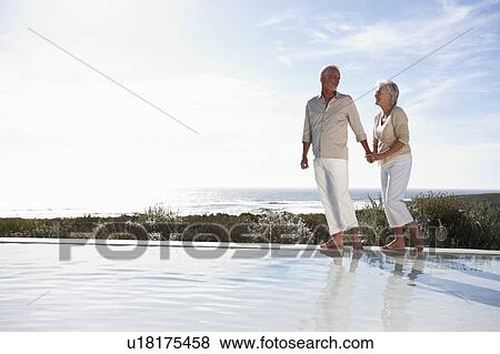 Stock Photo - Mature couple at the seaside. Fotosearch