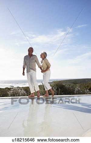 Mature couple on holidays View Large Photo Image Stock Photograph - Mature couple on holidays. Fotosearch