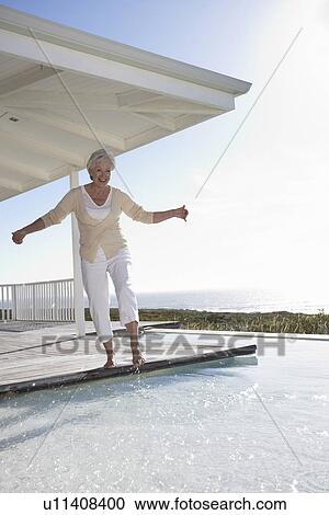 Mature woman having fun View Large Photo Image Stock Image - Mature woman having fun. Fotosearch
