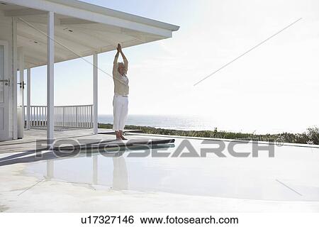 Mature woman meditating View Large Photo Image Stock Photograph - Mature woman meditating. Fotosearch