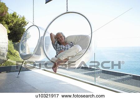 Stock Photo - Mature woman relaxing. Fotosearch