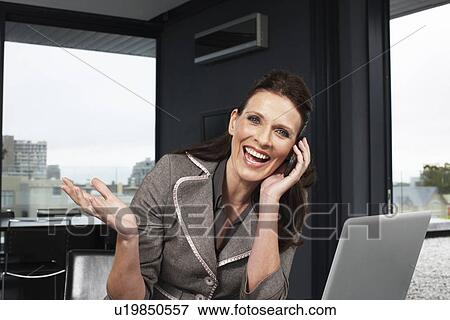 Stock Photo - Middle aged business woman. Fotosearch