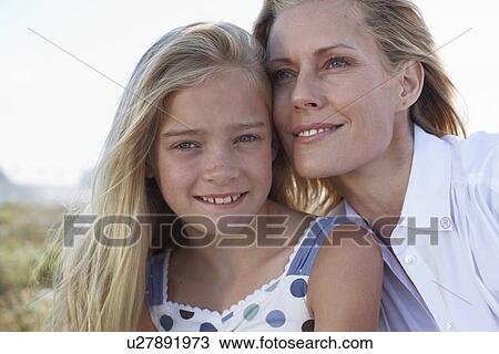 Stock Image - Mother and daughter portrait. Fotosearch