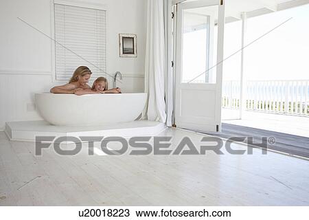 Stock Image - Mother with her daughter. Fotosearch