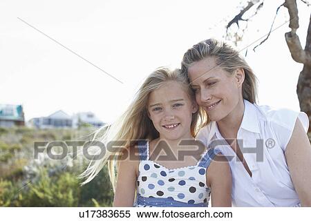Stock Photography - Mother with her daughter. Fotosearch