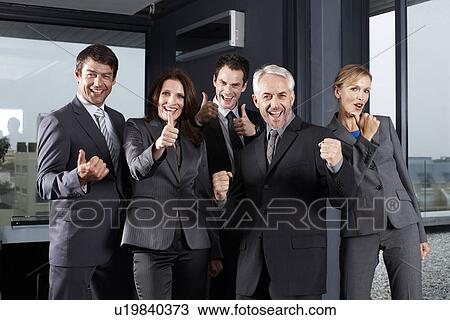 Stock Image - Motivated business team. Fotosearch