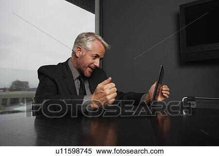 Motivated businessman View Large Photo Image Stock Photography - Motivated businessman. Fotosearch
