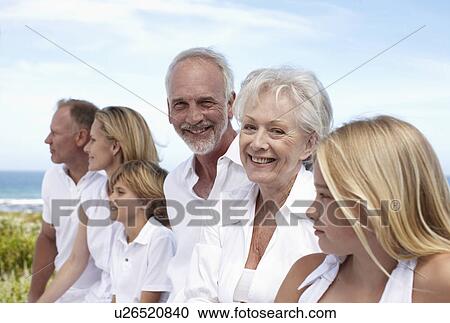 Mult-generation family outdoors View Large Photo Image Stock Image - Mult-generation family outdoors. Fotosearch