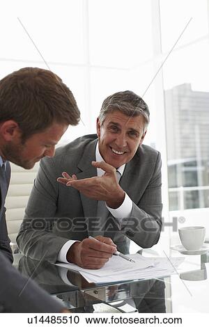 Negotiating a contract View Large Photo Image Stock Image - Negotiating a contract. Fotosearch