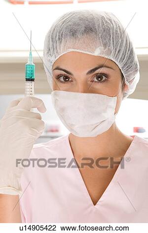 Nurse with a syringe View Large Photo Image Stock Image - Nurse with a syringe. Fotosearch