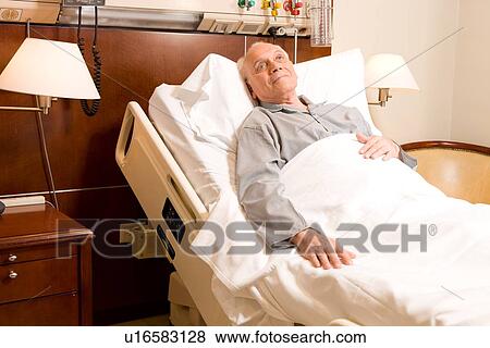 Old man in hospital bed View Large Photo Image Stock Photo - Old man in hospital bed. Fotosearch