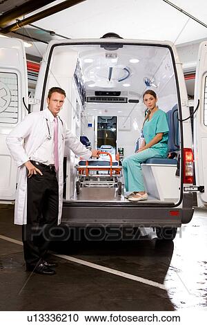 Paramedics in an ambulance View Large Photo Image Stock Image - Paramedics in an ambulance. Fotosearch