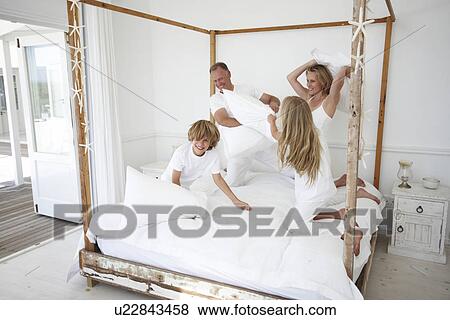 Parents playing with their kids View Large Photo Image Stock Photo - Parents playing with their kids. Fotosearch