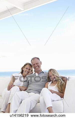 Parents with their daughter View Large Photo Image Stock Photo - Parents with their daughter. Fotosearch