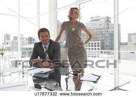 Stock Image - People at an office. Fotosearch