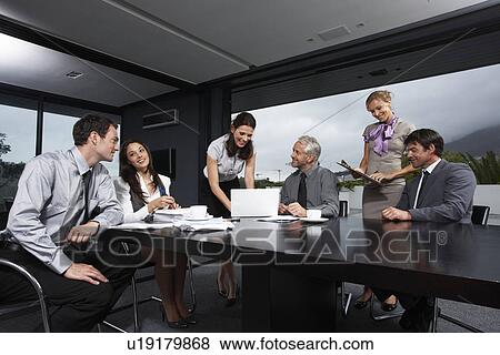 Stock Photo - People at work. Fotosearch