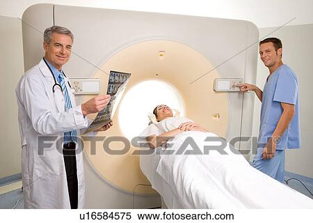 Performing a tomography View Large Photo Image Stock Photography - Performing a tomography. Fotosearch