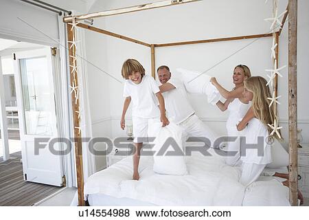 Stock Photo - Pillow fighting. Fotosearch
