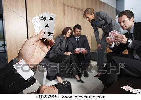 Stock Image - Playing with cards. Fotosearch