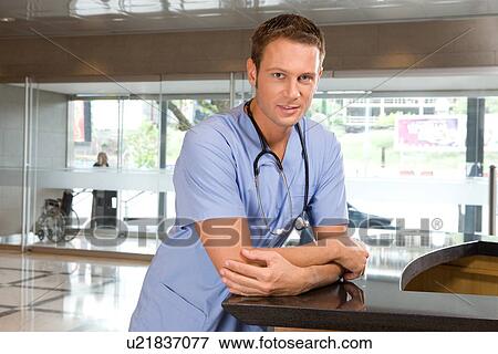 Portrait of a young doctor View Large Photo Image Stock Photo - Portrait of a young doctor. Fotosearch